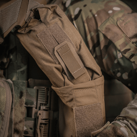 M-Tac mediclomme Small Vertical Elite i slitesterkt multicam-nylon med NIJ-sertifisering, vist i galleri posisjon 1 på taktisk utstyr.