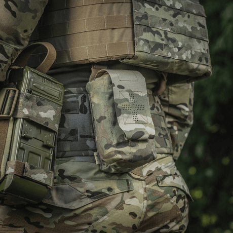 M-Tac Mediclomme Small Vertical Elite i multicam-nylon med NIJ-sertifisering, designet for taktisk kroppsbeskyttelse, vist i galleri posisjon 1.