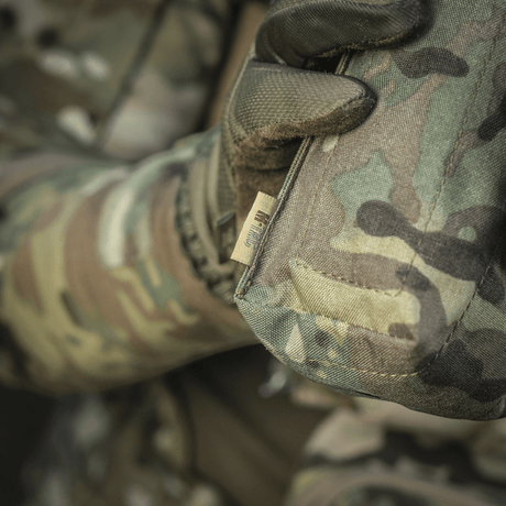 M-Tac mediclomme Small Vertical Elite i slitesterkt multicam-nylon med NIJ-sertifisering og integrert IFAK-organizer, vist i galleri posisjon 1.