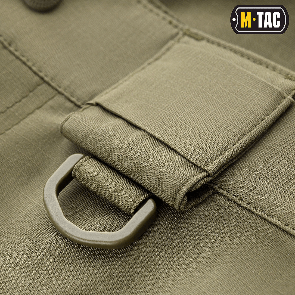 Detalje af M-Tac Shorts Aggressor Short med taktisk D-ring i elastisk polycotton flex rip-stop materiale.