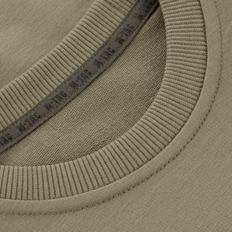 M-Tac Pullover 4 Seasons med elastisk rund hals, designet for allround bruk. Laget av 95% bomull og 5% elastan