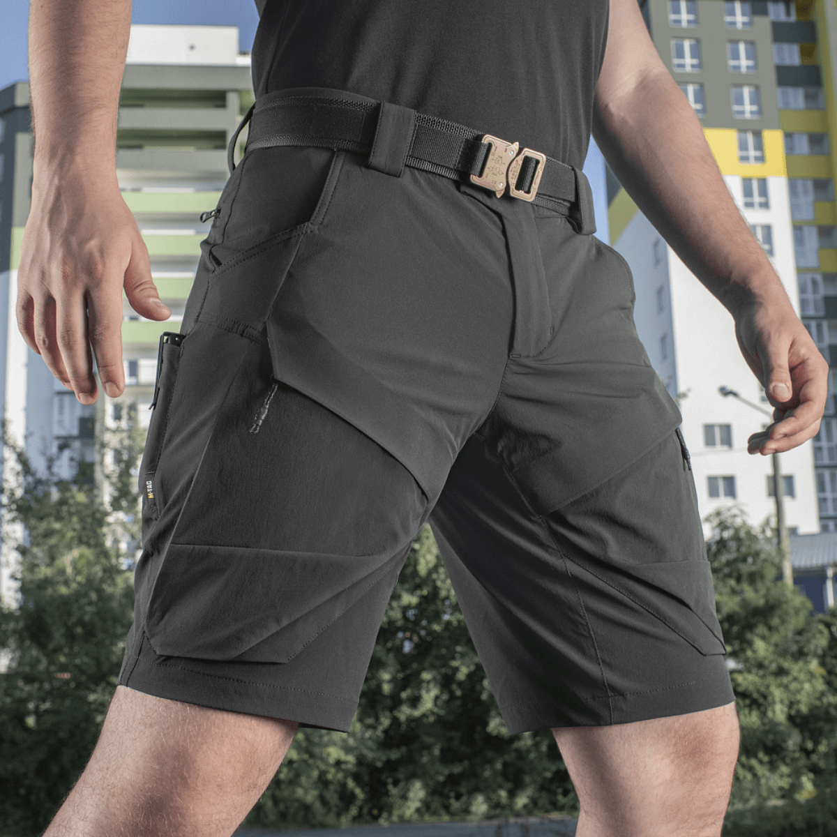 M-Tac Shorts Rubicon Flex i mørk oliven med cargo-lommer, designet til komfort og funktionalitet. Perfekte til sommeraktiviteter.