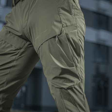 M-Tac Bukser Rubicon Flex i vandtæt 4-Way Stretch stof med innovativ cargo-lomme design, perfekte til træning og udendørs aktiviteter.