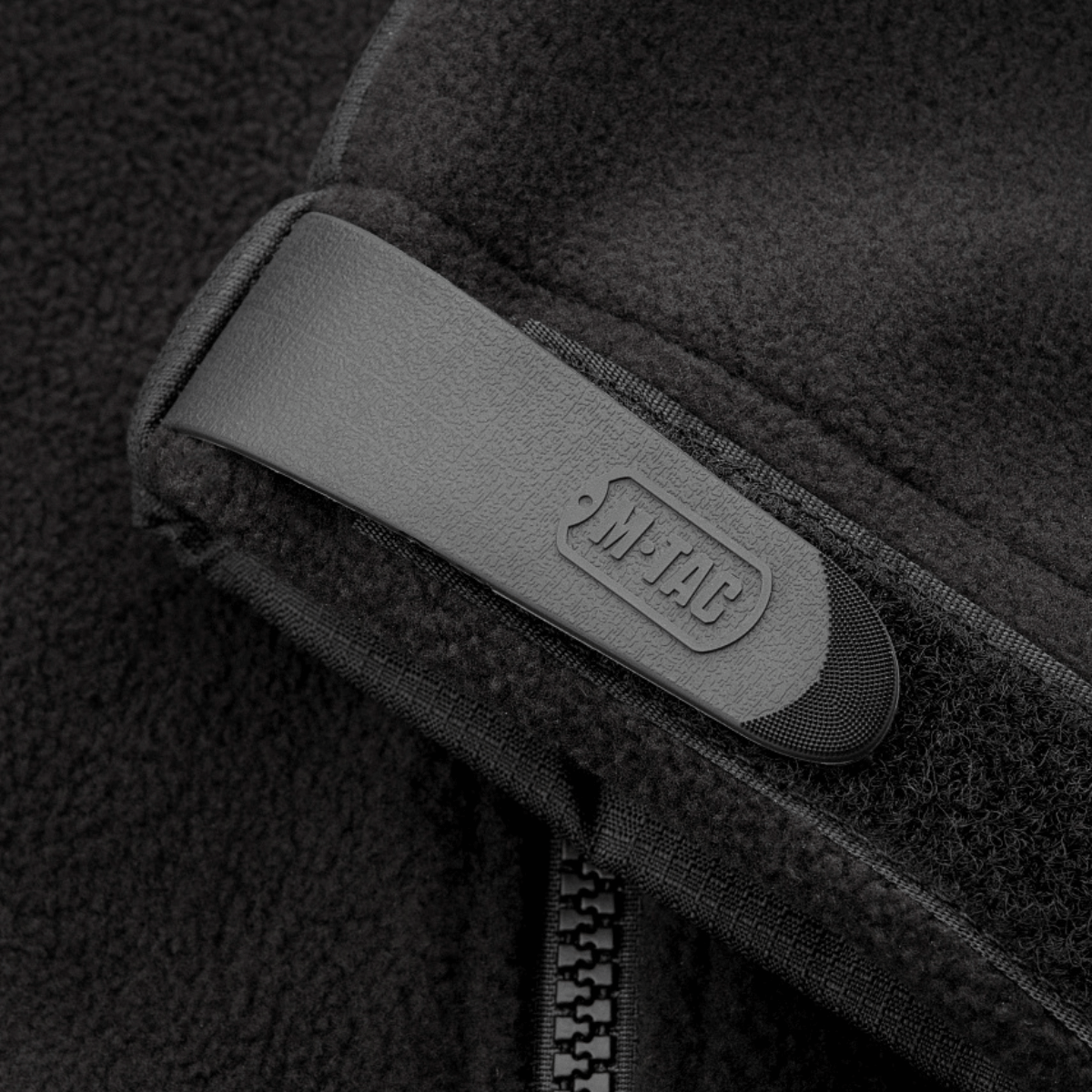 Nærbillede af M-Tac Alpha Microfleece Jakke Gen.II med forstærket fleece og Oxford nylon for ekstra slidstyrke.