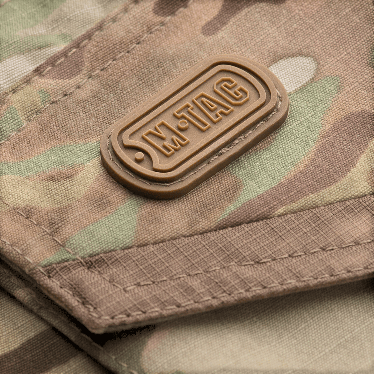 M-Tac Bukser Aggressor Elite NYCO multicam med slidstærkt nylon-bomuldsmateriale og M-Tac gummilogo, gallery position 1.