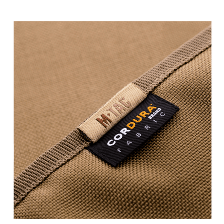 M-Tac Pung Elite i slitesterkt Cordura-nylonstoff med merkelapper, stilrent design for taktisk og daglig bruk.