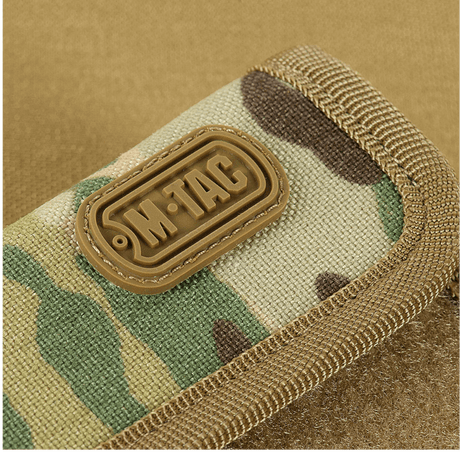 M-Tac pung med Patch Panel Elite Gen. II laget av slitesterkt Oxford- og Cordura 500D-materiale i kamuflasjemønster.
