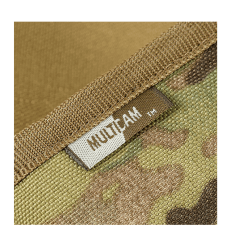 M-Tac pung med Patch Panel Elite Gen. II i slitesterkt Oxford- og Cordura 500D-stoff med MultiCam-mønster, nærbilde av tekstilstruktur.
