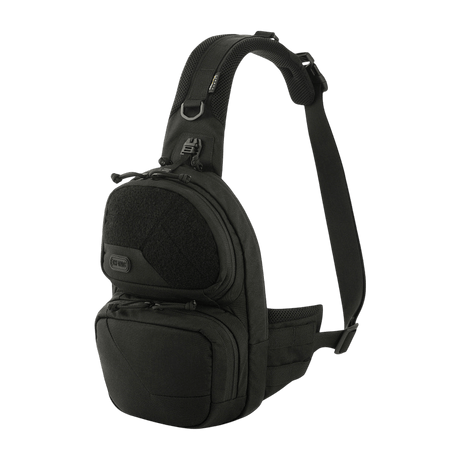 M-Tac Buckler Taske Elite i svart med MOLLE-system, to ytre lommer og skjult rom for våpen, laget av Cordura 500D.