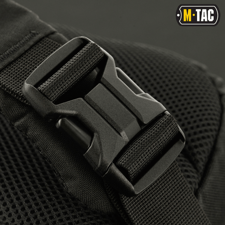 M-Tac Buckler Taske Elite svart spenne, robust design i Cordura 500D, for taktisk bruk med MOLLE-system, sikker oppbevaring av utstyr.
