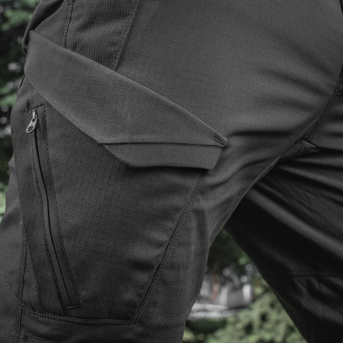 Close-up of M-Tac Aggressor Summer Flex Shorts pocket design in black, showcasing tactical style and durable Flex Rip-Stop fabric.