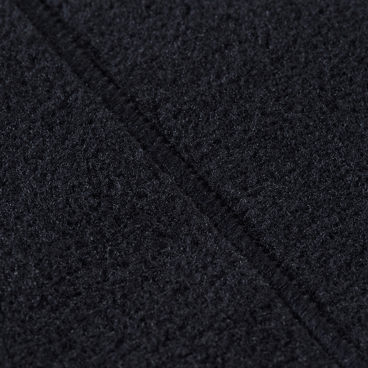 Nærbillede af mørkt Polartec® 200 fleece-materiale fra M-Tac Sprint Fleece Sweatshirt Polartec, der viser detaljerne i stoffet.