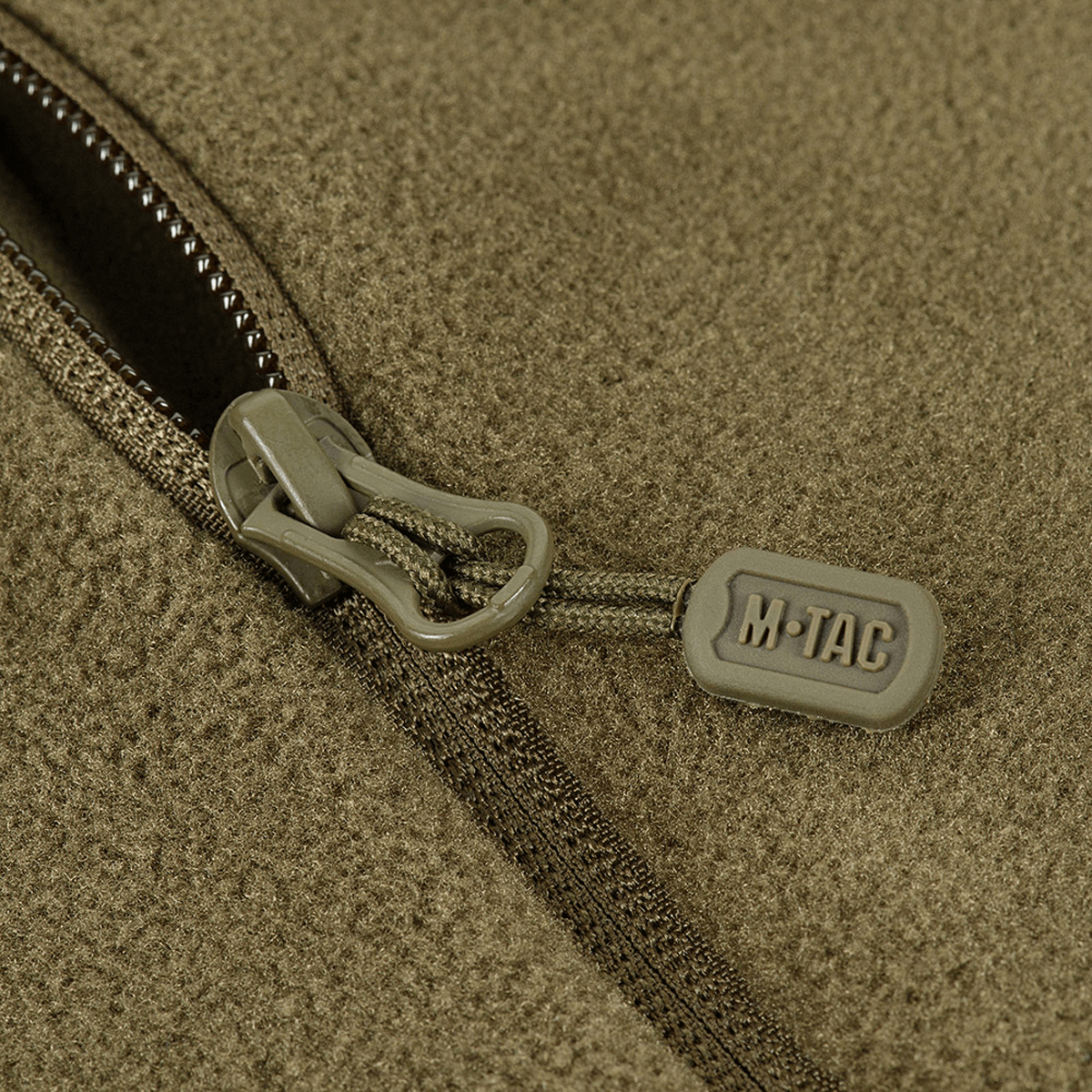 M-Tac Sprint Fleece Sweatshirt Polartec lynlåsdetalje i holdbart materiale, der fremhæver stil og funktionalitet i hverdagsbrug.