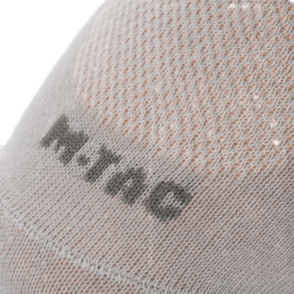 M-Tac Let Sportsokker til løb og udendørsaktiviteter, åndbare og komfortable med ergonomiske trykpunkter, i nærbillede af stoffet.