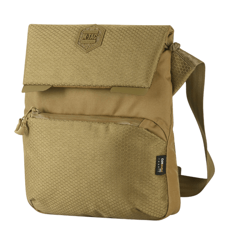 M-Tac Konvert Taske Elite i slitesterkt Cordura med justerbar skulderrem og magnetventil. Ideell for allsidig bruk og komfort.