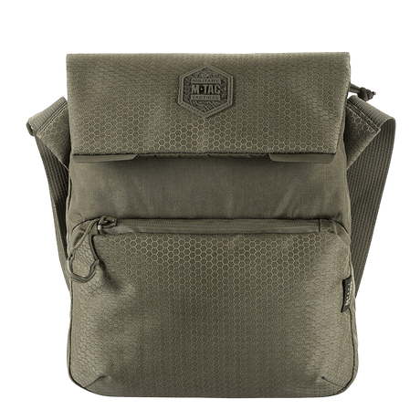 M-Tac Konvert Taske Elite i Cordura-materiale med justerbar skulderrem og magnetisk lokk, ideell for allsidig bruk og komfort.