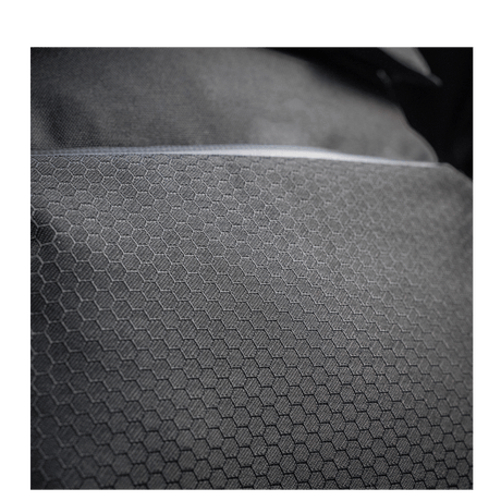 Nærbilde av M-Tac Konvert Taske Elite i Cordura Hex 1000D, som viser tekstur og mønster. Slitesterkt og komfortabelt design.