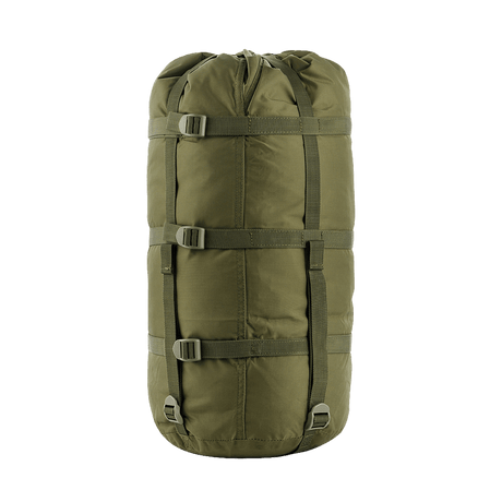 M-Tac kompresjonspose i slitesterkt nylon, ideell for oppbevaring, med kompresjonsstropper for plassbesparelse. Vannavvisende og robust design.