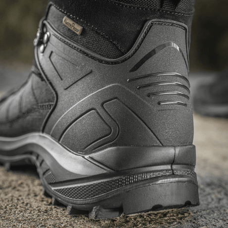 M-Tac taktiske sesongstøvler i lær og Cordura®, egnet for krevende terreng. Komfortable og slitesterke for trekking og utendørs bruk.