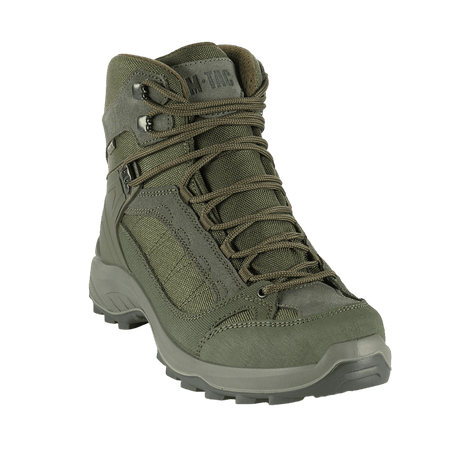 M-Tac taktiske sesongstøvler i grønt med semsket skinn og Cordura-stoff, ideelle for taktiske oppgaver og trekking i krevende terreng.