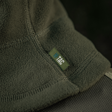 M-Tac Anatomisk Snood Justerbar Elite Fleece (320 g/m²) i blød, grøn fleece med mærkelabel, designet til koldt vejr og høj varmeisolering.