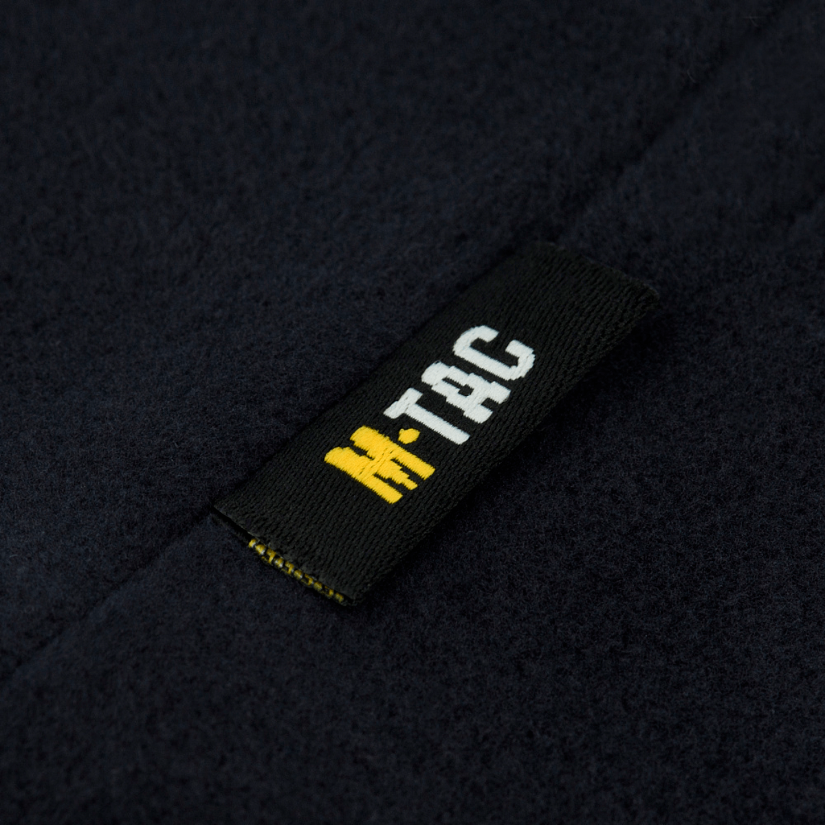 M-Tac Fleece Watch Cap Light Polartec Gen II med mærkeetiket på Polartec Micro Series fleece, vises i nærbillede for detaljer.