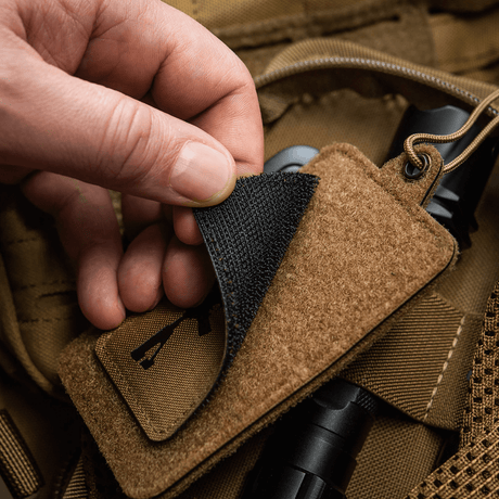 M-Tac AR-15 223/5,56 Laser Cut-patch festet på ryggsekk med Velcro, holdbart Cordura 500D-materiale for militær og friluftsbruk.