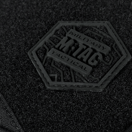 Nærbilde av M-Tac Sling Pistolveske Elite Hex med Velcro-logo i svart Cordura-materiale.
