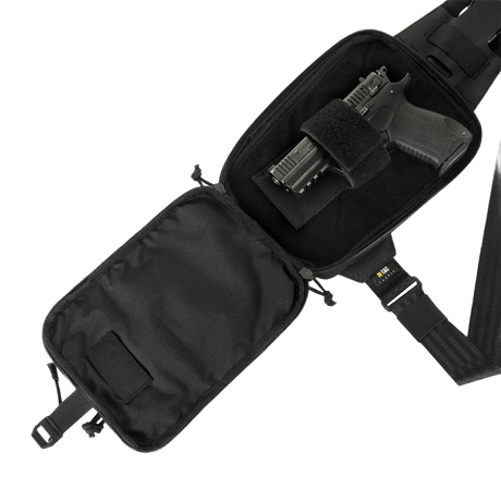M-Tac Sling Pistolveske Elite Hex med Velcro åpnet med pistol inni, justerbar skulderreim og robust materiale.