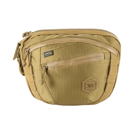 M-Tac Sphaera Hex Hardsling Bag Large Elite i sandfarget med heksagonmønster og glidelåslomme foran, ideell for utendørsaktiviteter.