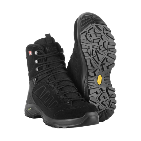 M-Tac Tactical Vinterstøvler i svart, robuste og sklisikre støvler med Primaloft-isolasjon og Vibram-såle, ideelle for krevende utendørsbruk.