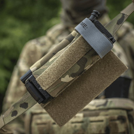 M‑Tac Tourniquet Pouch Elastic Gen.5 på taktisk utstyr med elastiske bånd og borrelås, ideell for CAT tourniquet, Cordura 500D-materiale.