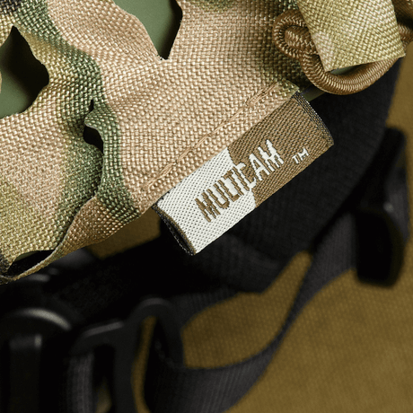 M‑Tac Vilha Hjelmcover Elite i MULTICAM-camouflage på FAST hjelm, beskytter mot smuss og slitasje, designet med Cordura 500D og Laser Cut mesh.