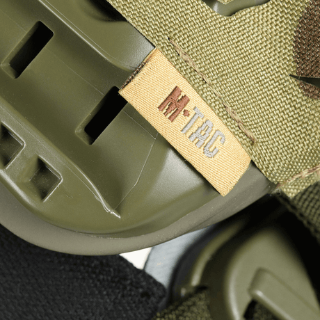 M‑Tac Vilha Hjelmcover FAST med Multicam-mønster og Cordura 500D materiale, kamuflasjedesign for FAST-hjelmer, enkel Velcro-festning.