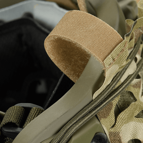 M‑Tac Vilha Hjelmcover FAST i Cordura 500D med Velcro-stropper og kamuflasjedesign for FAST-hjelmer, Multicam-mønster vist tett på.