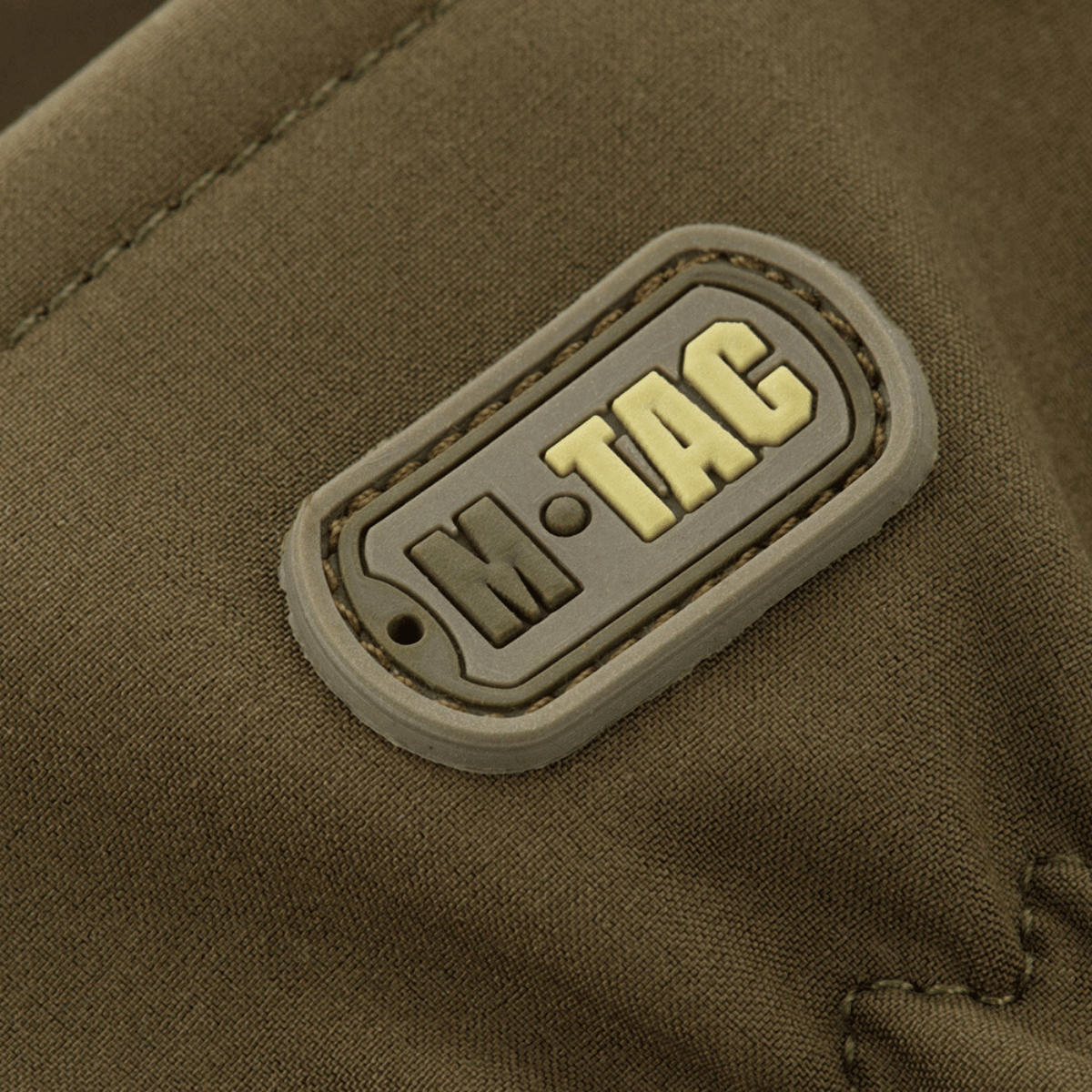M-Tac Vinterhandsker Soft Shell med logo, designet til beskyttelse mod dårligt vejr og maksimum komfort med minimal vægt.
