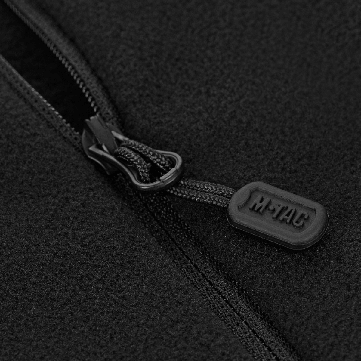 M-Tac Centurion Microfleece Jakke med YKK-lynlås detalje for nem på- og aftagning, innovativt design for komfort og mobilitet i kulde.