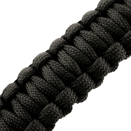 M-Tac Paracord armbånd med ildstarter, kompass og fløyte i svart tettvevd design for overlevelse og friluftsliv.