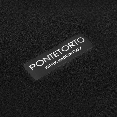 Nærbillede af M-Tac Centurion Microfleece Jakke med Pontetorto materiale, der viser etiketten 'Fabric Made in Italy'.