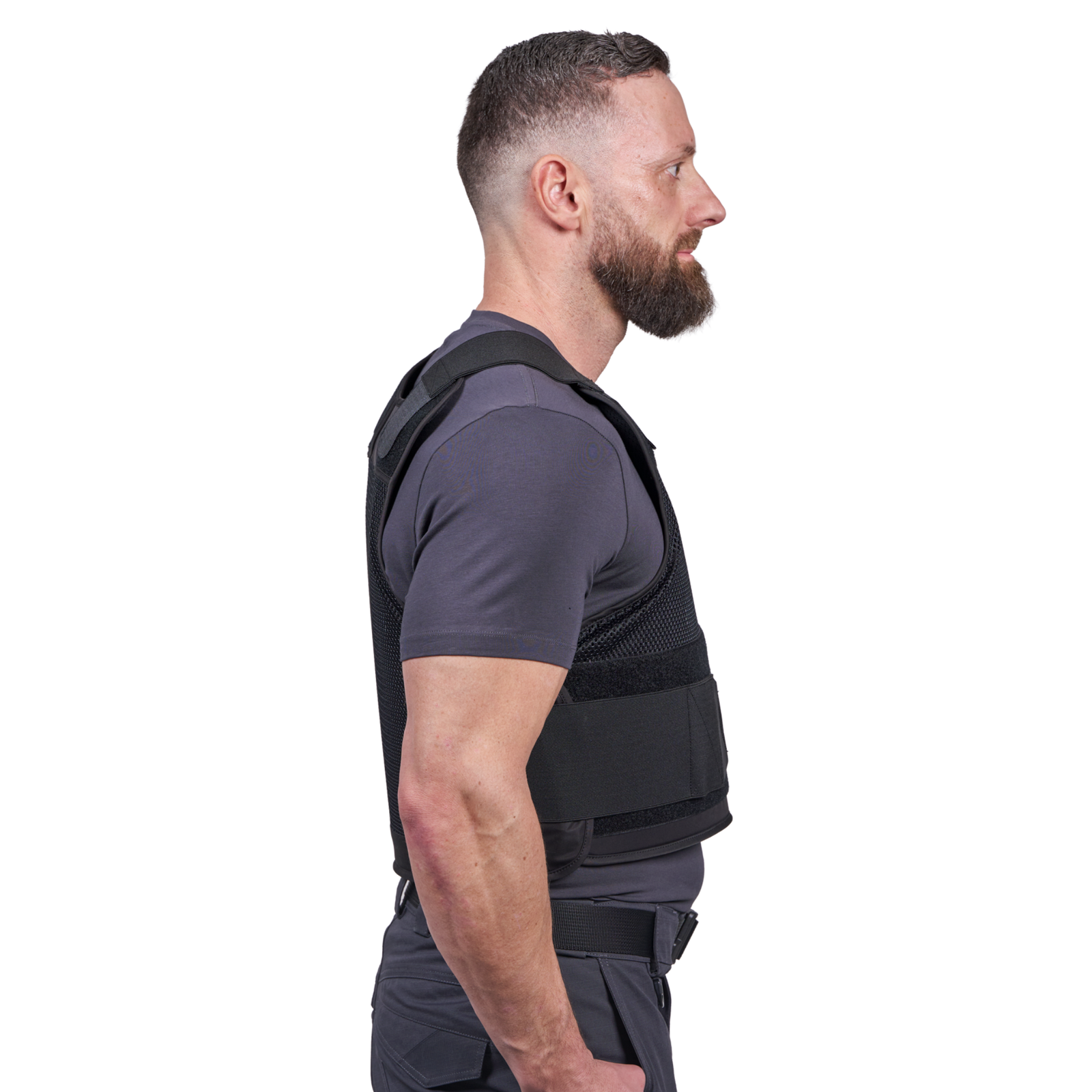 Mand iført RX2 stik- og skudsikker vest set i profil fra siden