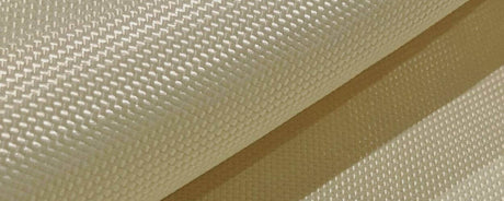 Hvilket materiale er en skudsikker vest lavet af?