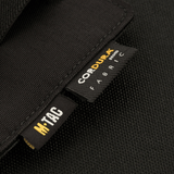 Nærbillede af M-Tac Double Mag Pouch Hook Backed Magazine lavet af Cordura-stof med etiketter