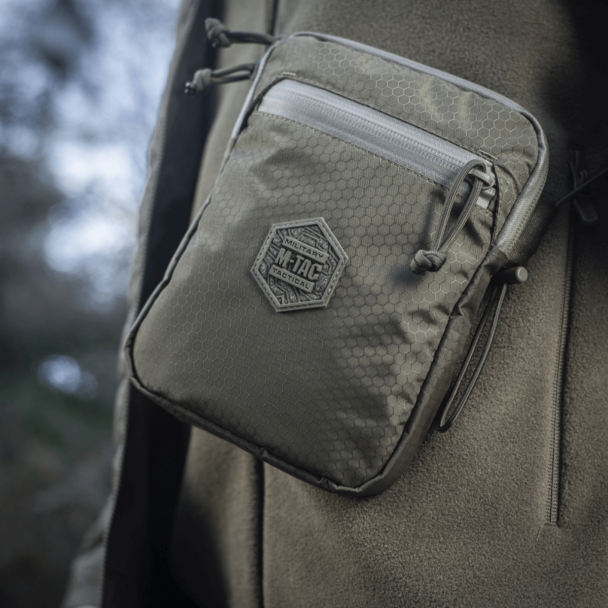 M‑Tac Pocket Bag Elite HEX i slidstærkt materiale med YKK lynlåse, ideel til opbevaring af småting, EDC-udstyr, nøgler og dokumenter.
