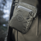 M‑Tac Pocket Bag Elite HEX i slidstærkt materiale med YKK lynlåse, ideel til opbevaring af småting, EDC-udstyr, nøgler og dokumenter.