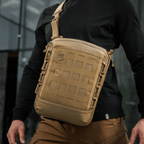 M-Tac Tablet Bag Laser Cut Hex in tan color worn crossbody, ideal for EDC, documents, and tablets with Laser Cut MOLLE design.