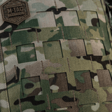 M-Tac Tablet Bag Laser Cut Hex med camo-design viser Laser Cut MOLLE panel til tilbehør, fremstillet i robust Cordura materiale.