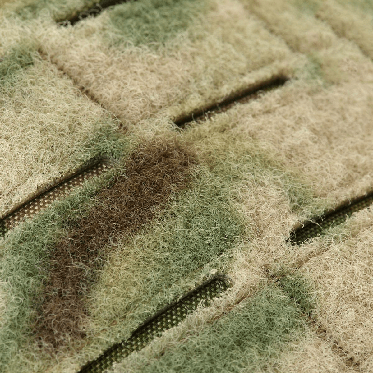 Detaljeret nærbillede af camouflage stof med fibermønster