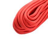 Rød M‑Tac Paracord 550 Type III 15 m nylonkordel ideel til friluftsbrug, med 7 nylontråde og 240 kg brudstyrke.