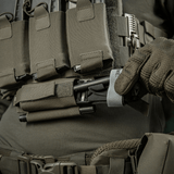 M‑Tac Tourniquet Pouch Elastic Gen.5 fastgjort til taktisk udstyr, viser elastisk bånd og velcro til hurtig adgang til tourniquet.