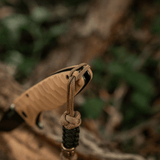 M-Tac Lanyard Scandinavian Small Chinese Knot on knife handle in outdoor setting